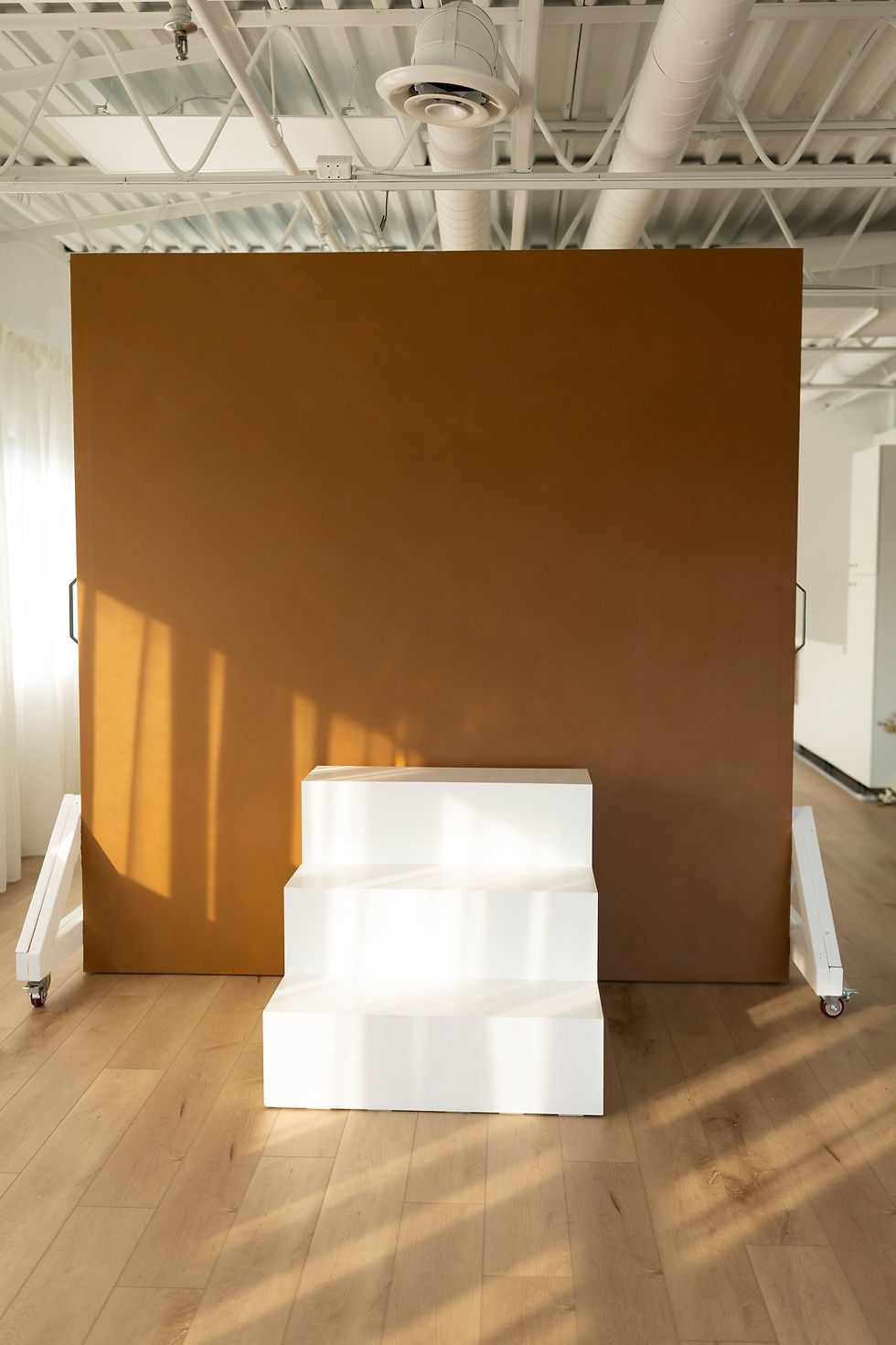 Cozy corner of the Ottawa photo studio with warm lighting