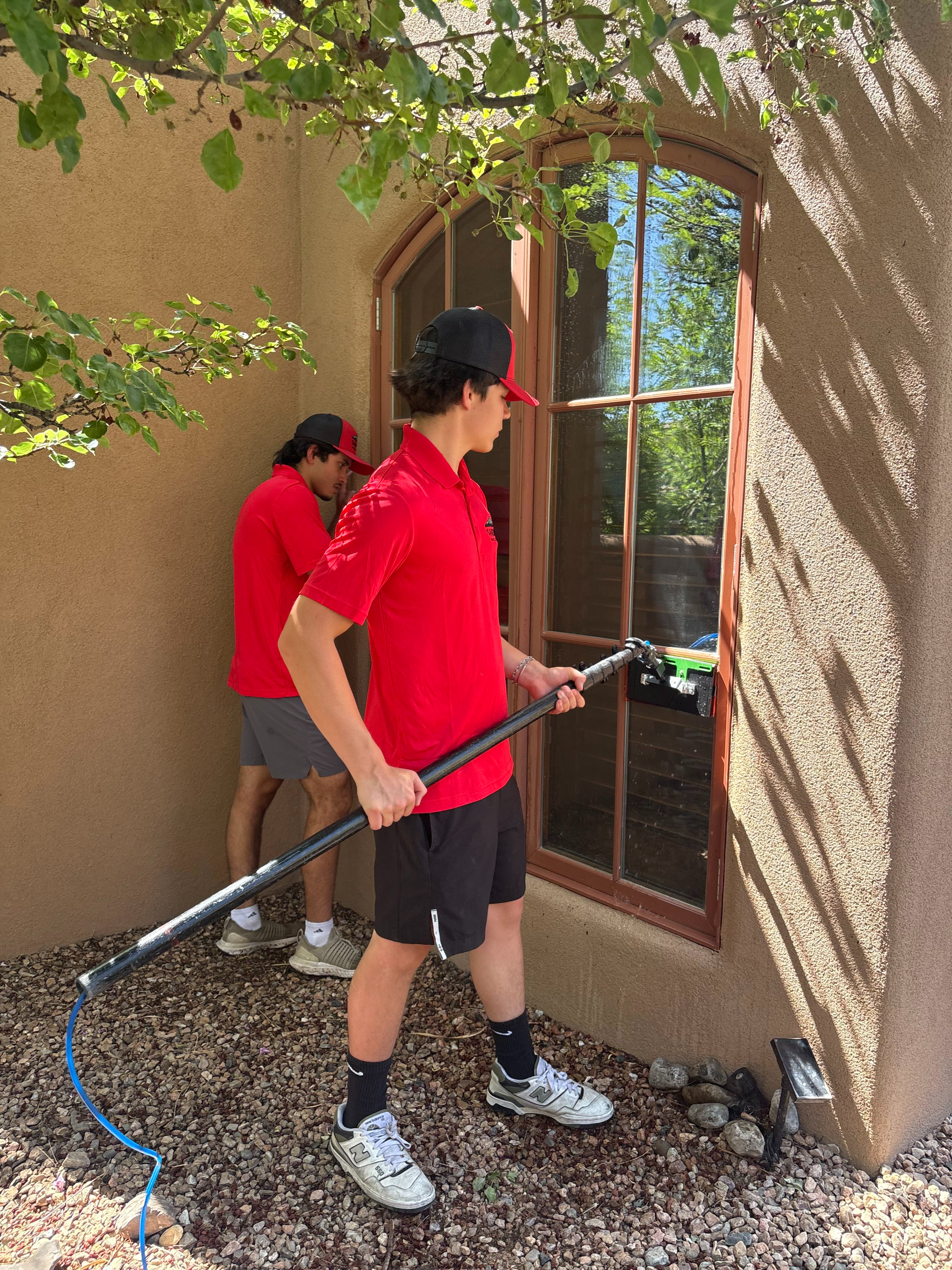 Clean windows on residential property