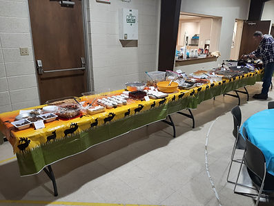 Serving Table loaded with Wild and domestic foods