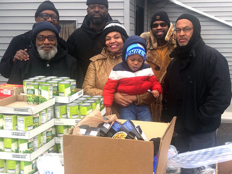 Combating Hunger-Community organizations team up to feed nearly 600 Lansing families