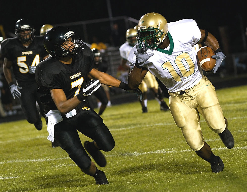 2004 - Marcus Freeman returning a fumble - Photo Courtesy of Lisa Billings/RTD