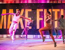 contemporary dancers smiling in lively performance