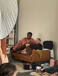 Behind the scenes CoCA dance photoshoot sitting on the couch