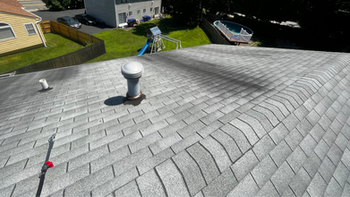 Before roof wash and stain removal on a house North Providence, RI