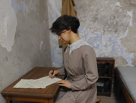 Image of Countess Marckievic in her cell writing a letter (photo credit_ Conach Gibson-Fei