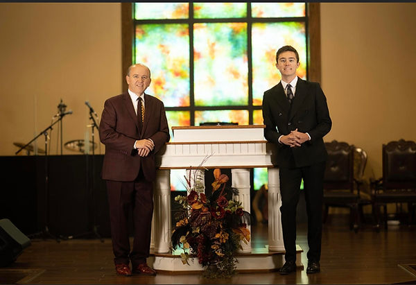 Pastor Abernathy and grandson