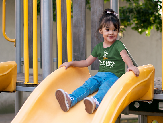 t-shirt-mockup-featuring-a-little-girl-on-a-slide-at-a-park-a7677.png