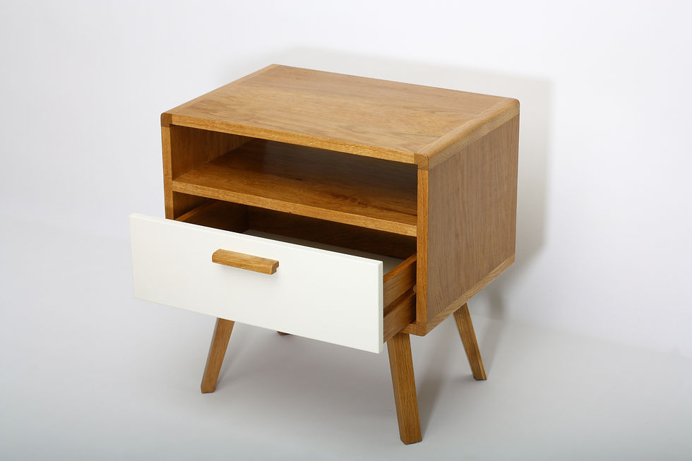 Thumbnail: Wooden nightstand with open white drawer and shelf, simple atelier28 design.