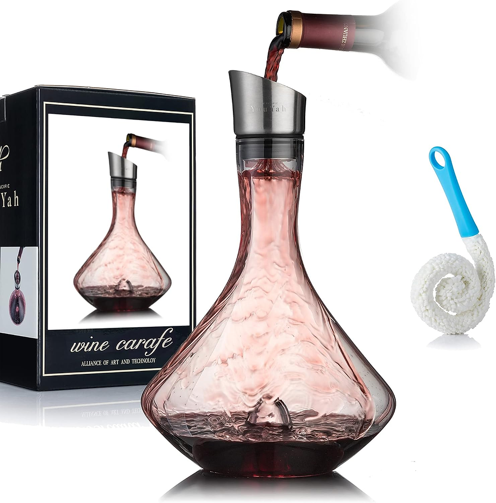 Wine carafe set with red wine pouring into a pink glass decanter, box labeled wine carafe, and a blue cleaning brush on white background