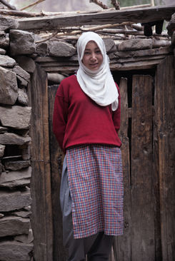 A young lady in front of a sheep pen. Her outfit marks a difference with the Buddhist area. In the north of the region, few kilometers from the Pakistan border,  the buddhist Ladakh gives  way to muslim Baltis communities.

Turtuk - Ladak, June 2022