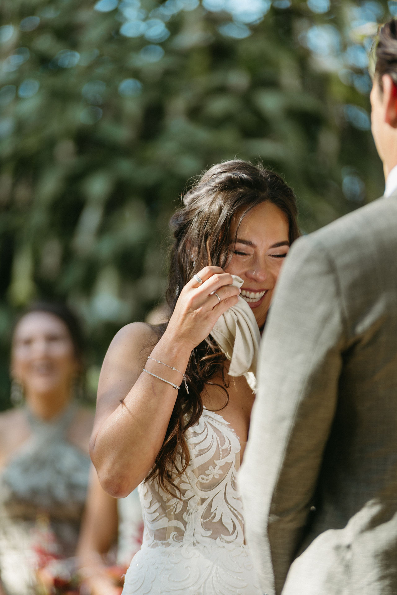 palos verdes south coast botanic garden ceremony bride smiling and wiping tears