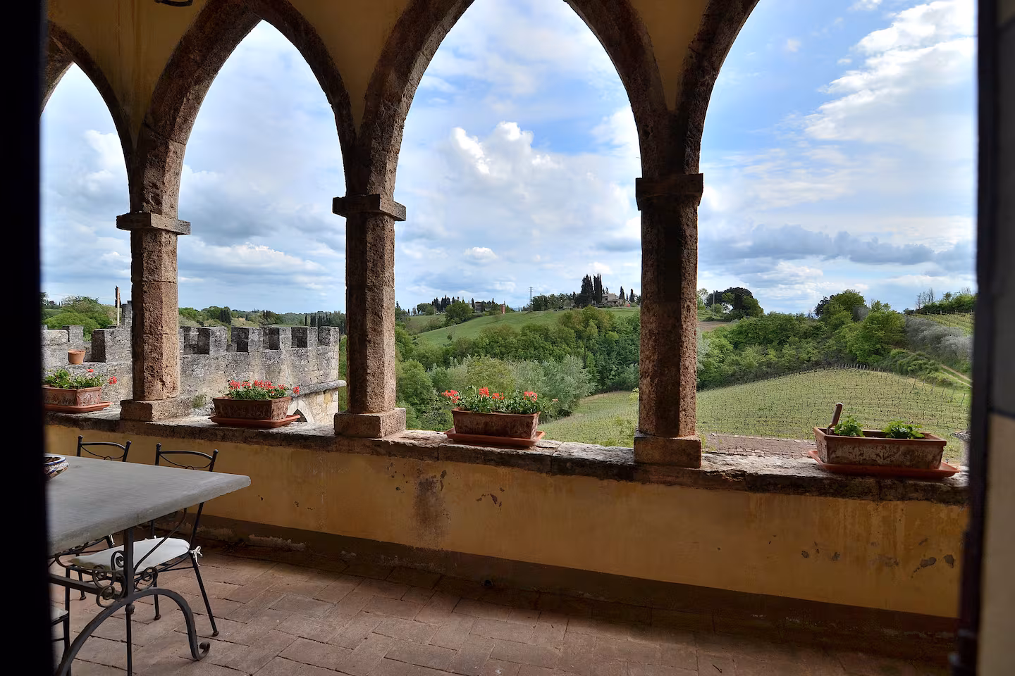 Arches and garden at castle wedding venue in Tuscany, Italy
