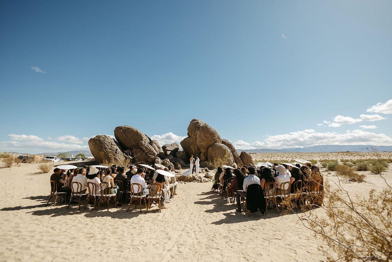 lgbtq+ wedding ceremony in the desert at nxwhere california joshua tree wedding
