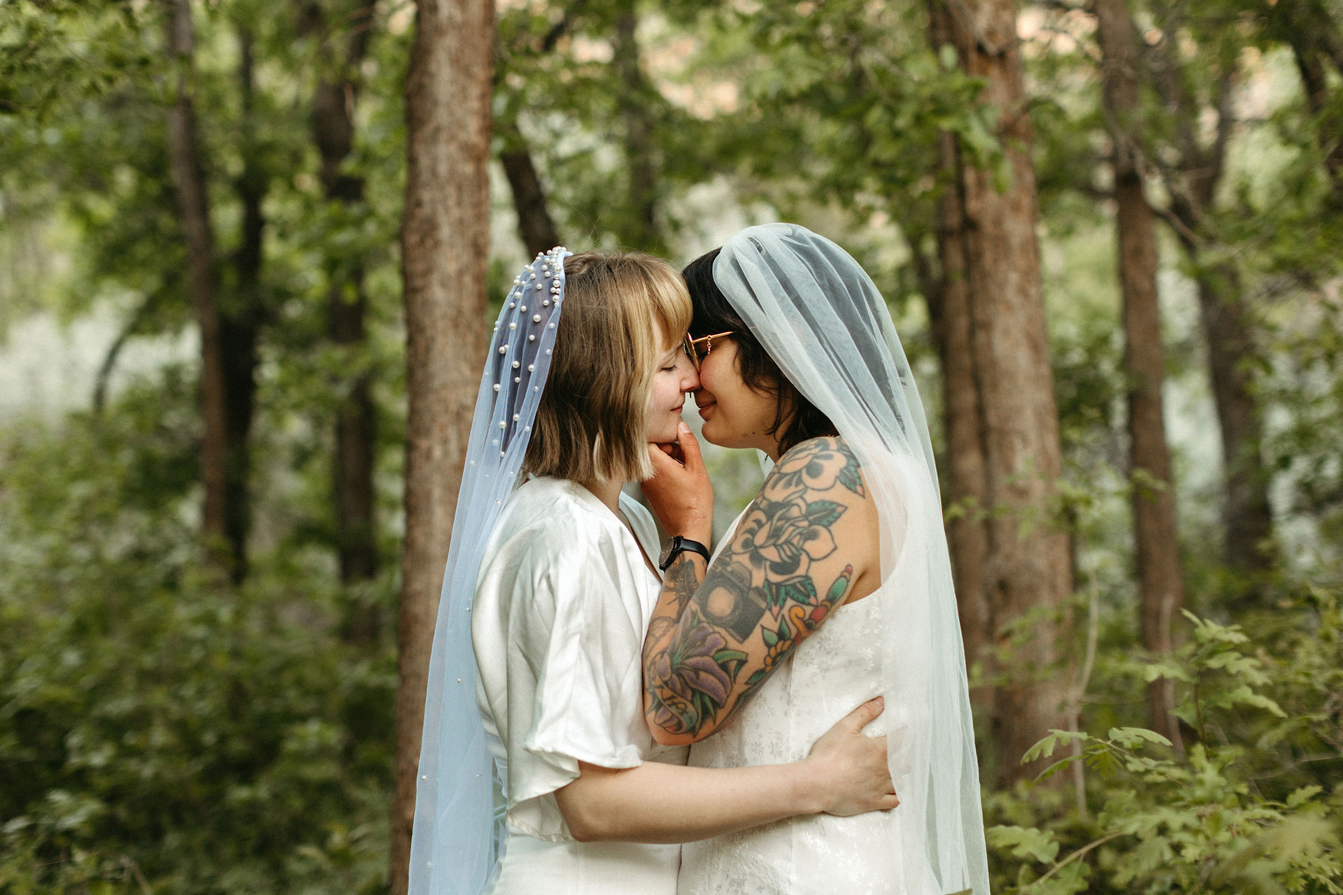 two brides kissing during zion national park elopement