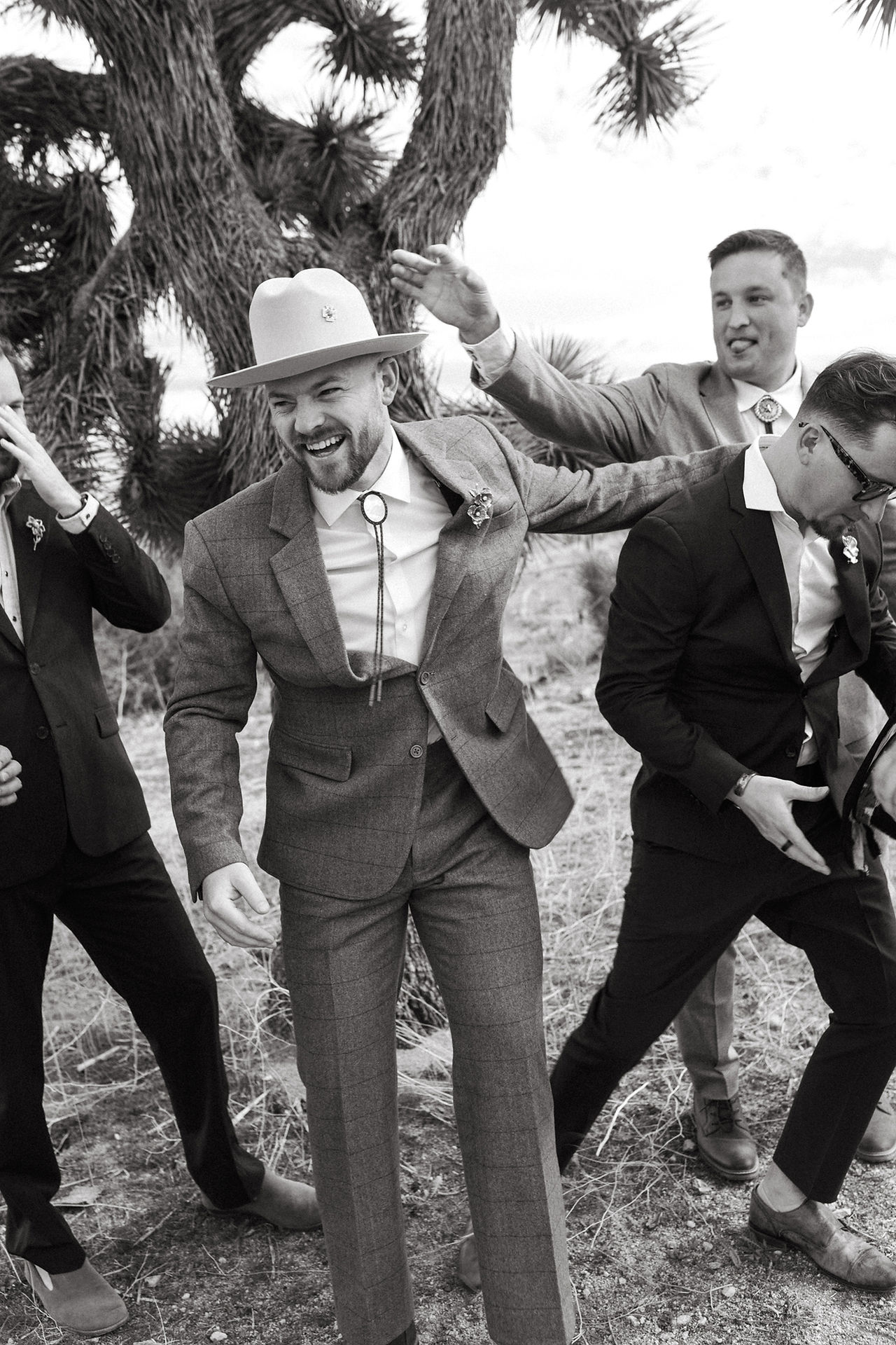 groomsmen hyping groom up fun groomsmen photo idea