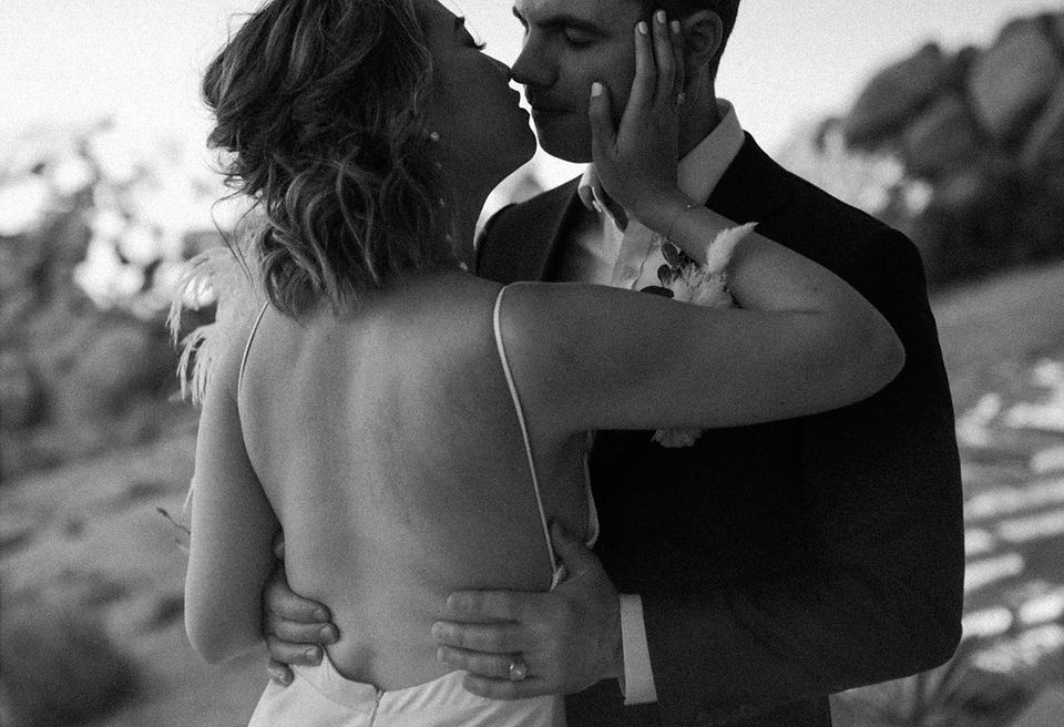 bride and groom almost kissing in joshua tree elopement