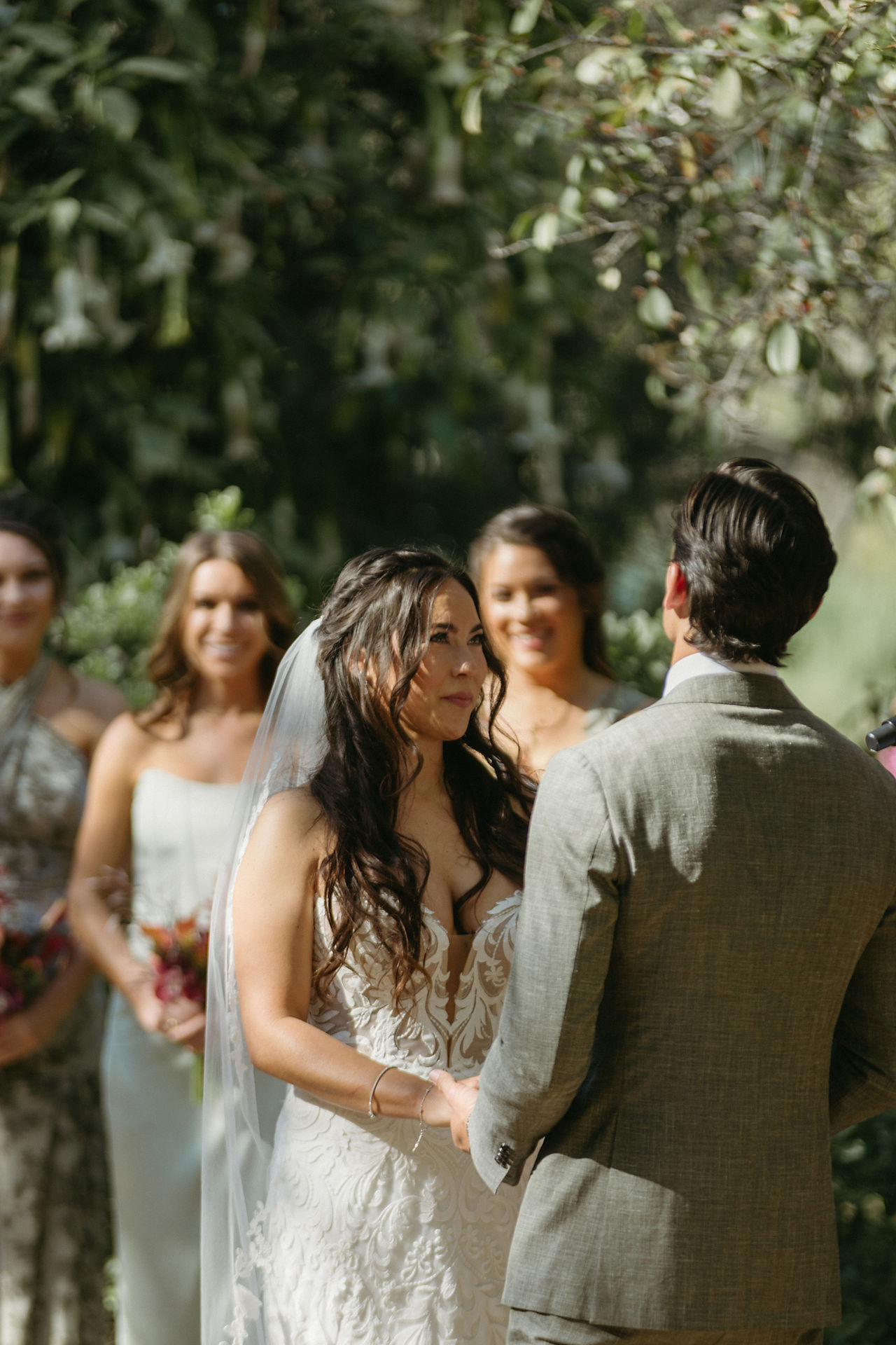 palos verdes south coast botanic garden ceremony bride looking at groom