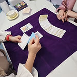 A person reading cards