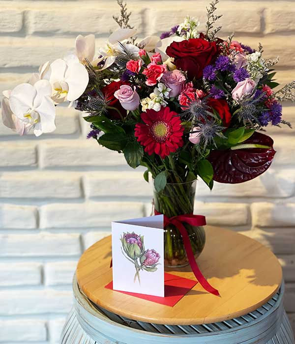 Thumbnail: Purple & Red Tropicals in a Vase
