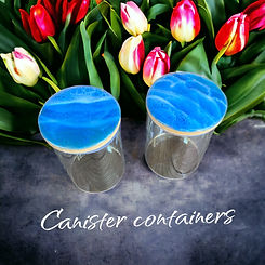 Canister containers with blue ocean resin lids.