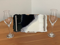 Black and white resin tray with silver accents