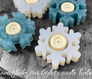 Snowflake tea light resin candle holders.