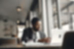 Black student on computer