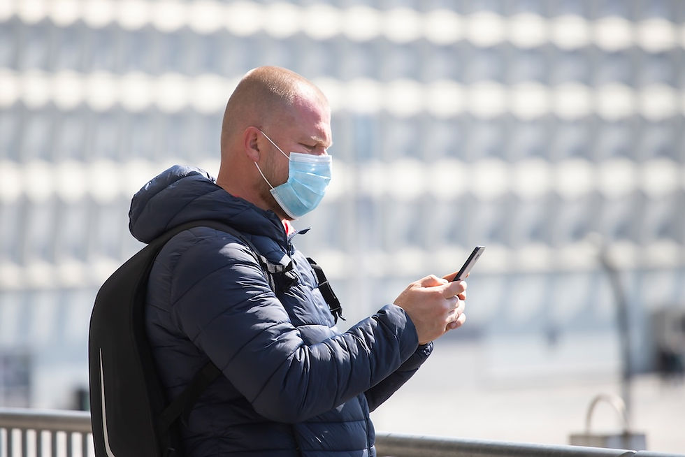 man taking photo outdoors
