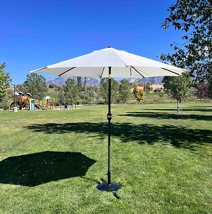 Tilting Ivory Umbrella Brown Pole Allstar Rentals.jpeg