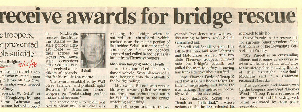 Recieve awards for bridge rescue