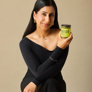 When Kaureen Randhawa was growing up with a severe nut allergy, pesto was always off the table. That was until her mom started making her own version, minus the nuts. Years later, that simple swap would inspire Besto, a clean, nut-free, seed-oil-free pesto that is changing the way we think about classic sauces. Made with real ingredients in a nut-free, gluten-free, and seed-oil-free facility, Besto is on a mission to make eating more inclusive and intentional. Proving that some of the best ideas start with the things we can’t have.