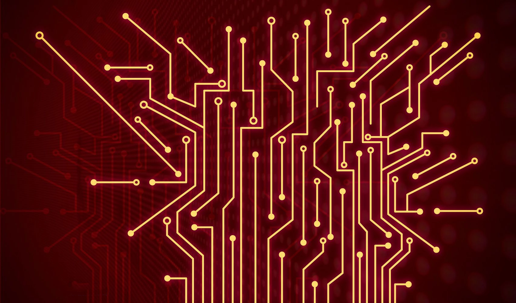 A network of technology cables arranged to resemble a tree shape set against a deep crimson backdrop.