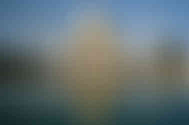 The image features the Taj Mahal, reflecting in a pool of water.