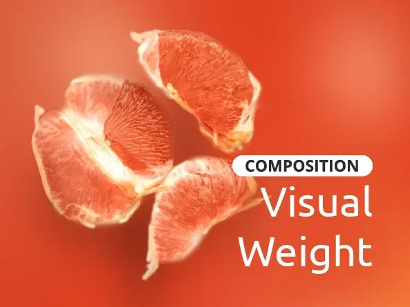 Three segments of grapefruit float against a smooth, warm orange background, highlighting their translucent texture and juicy interior.