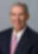 Thomas Davidson Sr. headshot in a dark suit with a pink tie against a gray background. Appears content and professional. The Everglades Foundation Board Member, International Game Fish Association's Fishing Hall of Fame. 