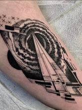 Fineline blackwork paper airplane flying through nebula on the inside bicep.