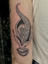 Botanical line art tattoo with dotwork gradient shading place above the elbow.
