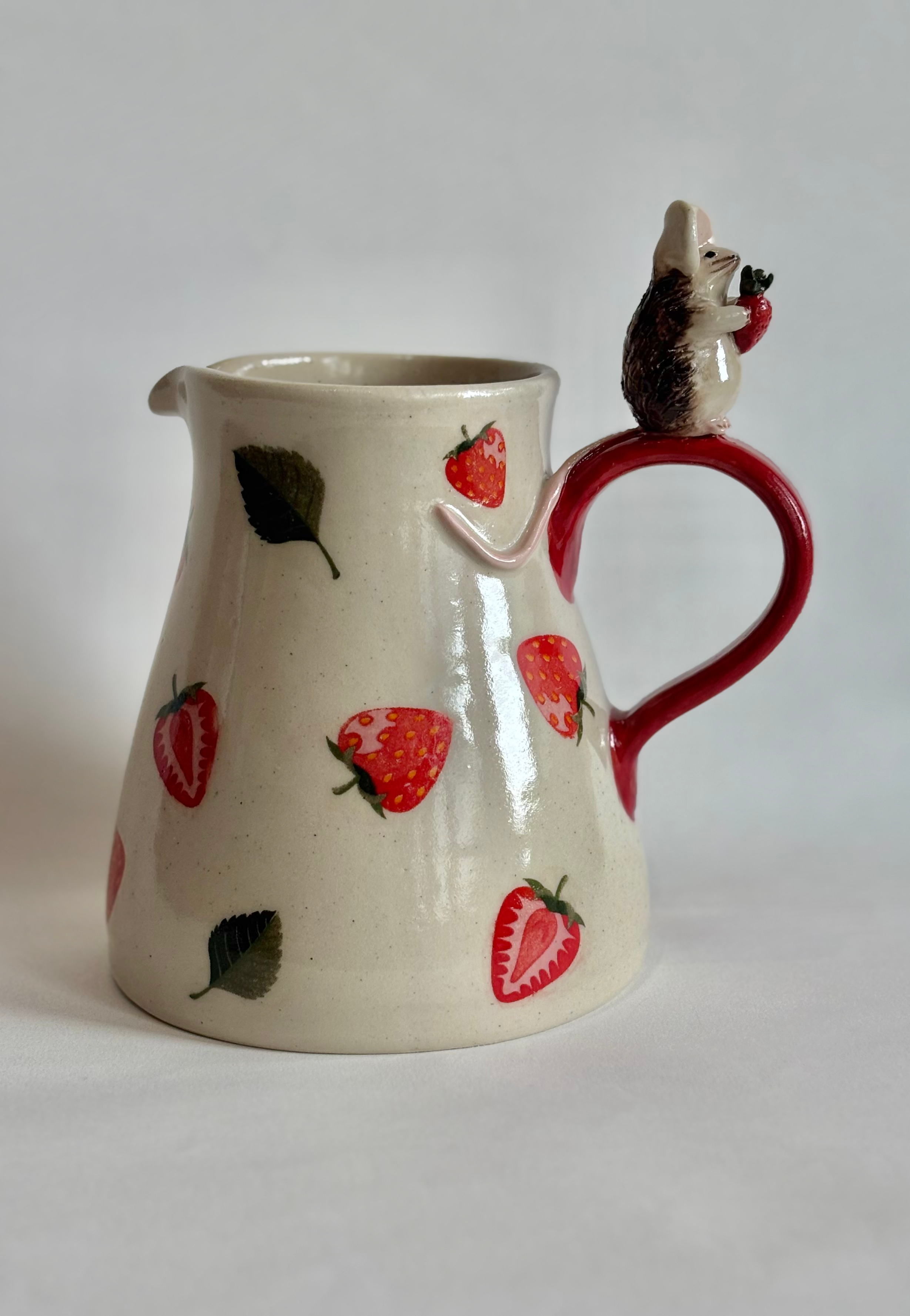 Mouse and strawberries cream jug