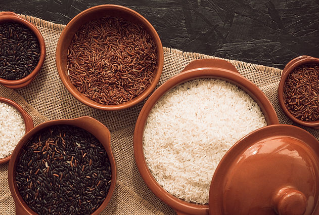 overhead-view-uncooked-rice-bowls-jute-table-cloth.jpg