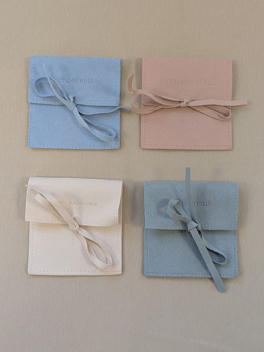 Bow Tie Closure Pouch