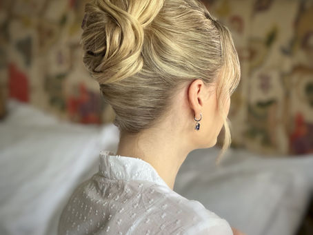 Our Signature French Pleat for the modern bride