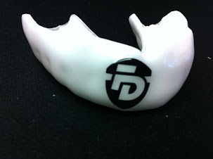 The Importance of Custom Mouthguards: Protecting Smiles in the UFC and Boxing