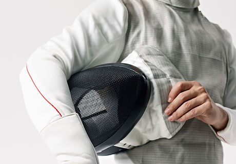 Fencer with protective mask