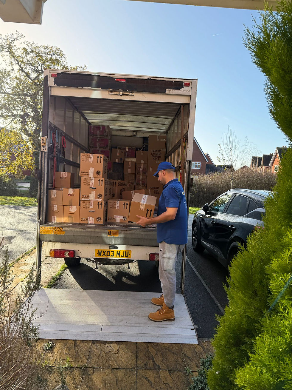 Labelled moving boxes ready for loading on moving day in Swindon