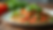 Close-up view of a colorful plate with fresh vegetables and grains