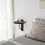 Thumbnail: Round wall shelf in walnut finish styled next to bed with beige bedding