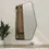 Thumbnail: Front view of MirRegular Irregular mirrored coat rack with walnut-tone shelf