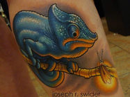 new school color tattoo of a blue chameleon perched on a branch looking at a glowing lightening bug
