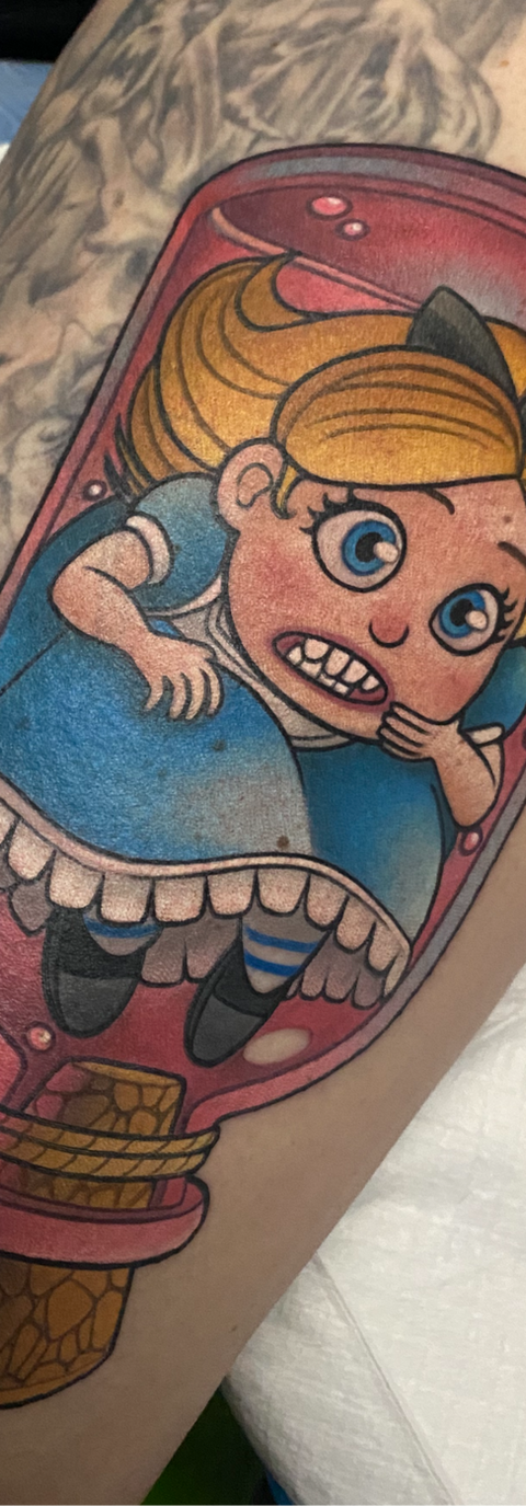 New school color tattoo of Alice in a corked pink jar with a tag on it that says "drink me" from Alice in Wonderland by Cracker Joe Swider in the Danbury, CT area