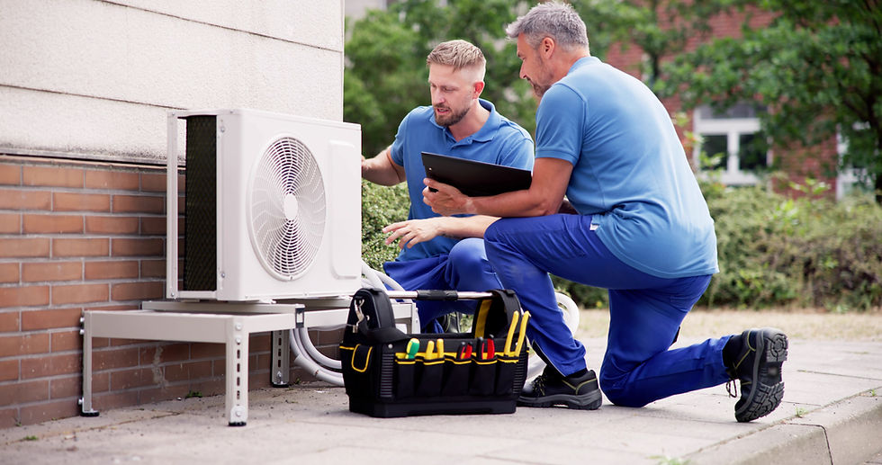 Residential HVAC service technician Performs spring tune up on air conditioning